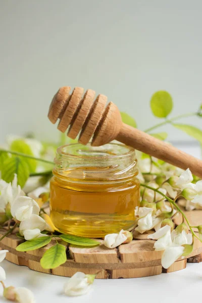 ACACIA HONEY. acacia flowers and jar