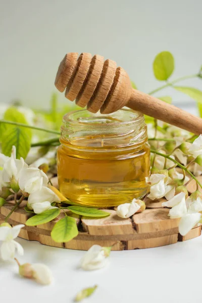 ACACIA HONEY. acacia flowers and jar