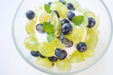 ice cream with green grape, mint and clueberry