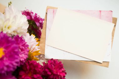 invitation card mockup with asters. autumn bouquet