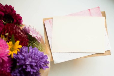 invitation card mockup with asters. autumn bouquet