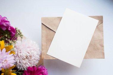invitation card mockup with asters. autumn bouquet