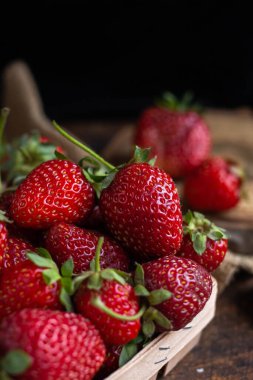 cup of tea with lemon. flowers and yelow sweater