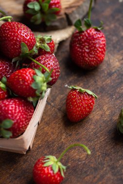 cup of tea with lemon. flowers and yelow sweater