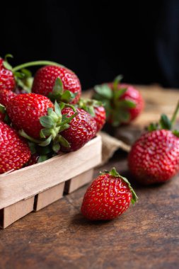 cup of tea with lemon. flowers and yelow sweater