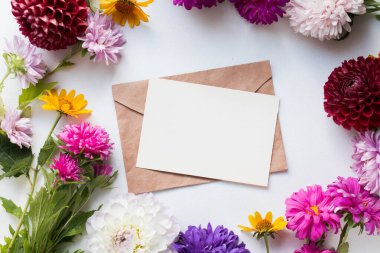 invitation card mockup with asters. autumn bouquet