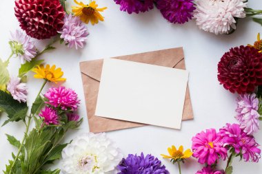 invitation card mockup with asters. autumn bouquet