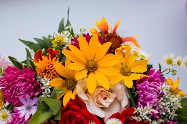 bouquet with vivid autunm flowers. flowers background