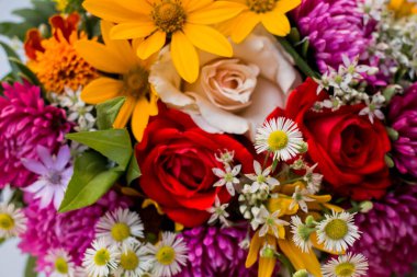 bouquet with vivid autunm flowers. flowers background