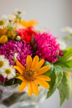 bouquet with vivid autunm flowers. flowers background