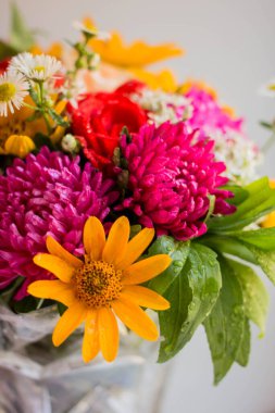 bouquet with vivid autunm flowers. flowers background