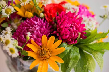 bouquet with vivid autunm flowers. flowers background