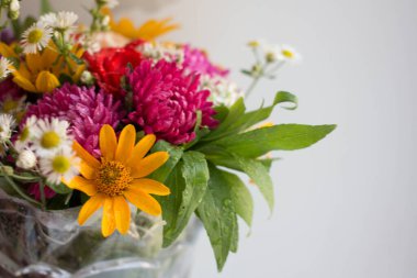 bouquet with vivid autunm flowers. flowers background