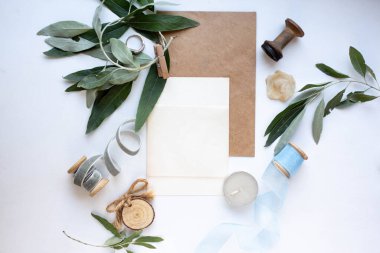 wedding invitation card with leaves and details