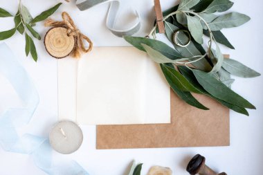 wedding invitation card with leaves and details