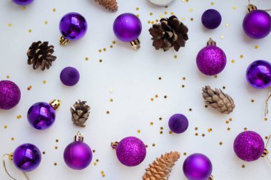 background with cones, Christmas toys, stars on a white table