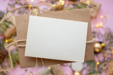 pink christmas with golden decoration. new year card mockup