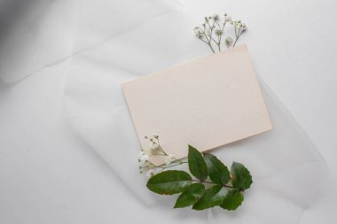 mockup card with plants. invitation card with environment Mockup with postcard card mockup with white flowers and envelope. wedding invitation 