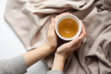 tea cup and autumn mood, fall season. dry leaves, cozy atmosphere