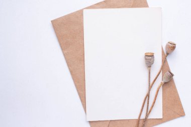 card mockup with dry flowers and envelope. invitation 