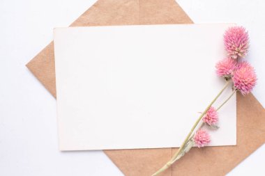 card mockup with dry flowers and envelope. invitation 