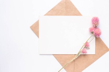 card mockup with dry flowers and envelope. invitation 