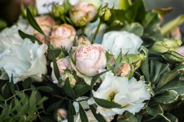 delicate bouquet with roses in a box