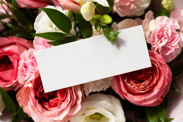 bouquet of flowers and a card from the sender. unknown admirer. Roses, carnations, lisianthus. card mockup