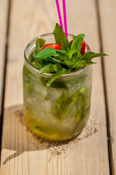 Non Alcoholic Mojito Mint Sprigs Lime Strawberries Glass Jar Ice — Stockfoto