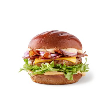 Hamburger with sauce, pork cutlet, bacon, salad, onion, cheese and sauce on a white background