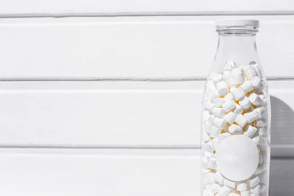 Transparent Jar Marshmallows White Table White Wooden Background — 스톡 사진