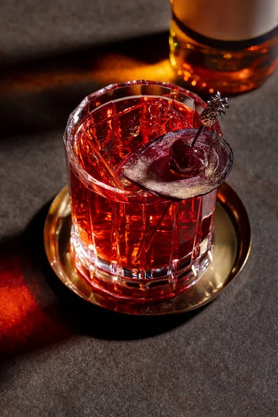 Glass Whiskey Ice Cherries Skewer Beets Stands Dark Table Bottle — Fotografia de Stock