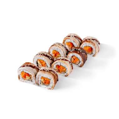 Rolls with eel, Korean carrots, cucumber, sesame seeds, sauce and tobiko caviar on a white background