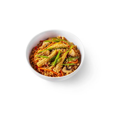 Rice with corn, mushrooms, onions, sesame seeds, pepper in a plate on a white background