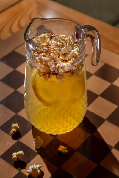 Summer Drink Large Decanter Lemonade Lemon Wedges Ice Caramel Popcorn — Stok fotoğraf