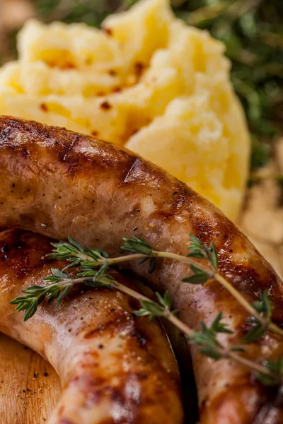 Grilled Chicken Sausages Mashed Potatoes Sauce Thyme Wooden Board — Stock Photo, Image