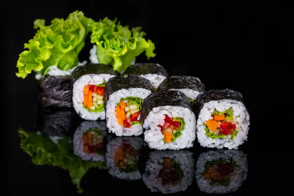 Roll Pepper Cucumber Carrot Salad Rice Nori Black Mirror Background — Stock fotografie