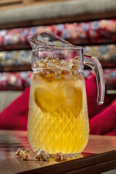 Summer Drink Large Decanter Lemonade Lemon Wedges Ice Caramel Popcorn — Stock Fotó