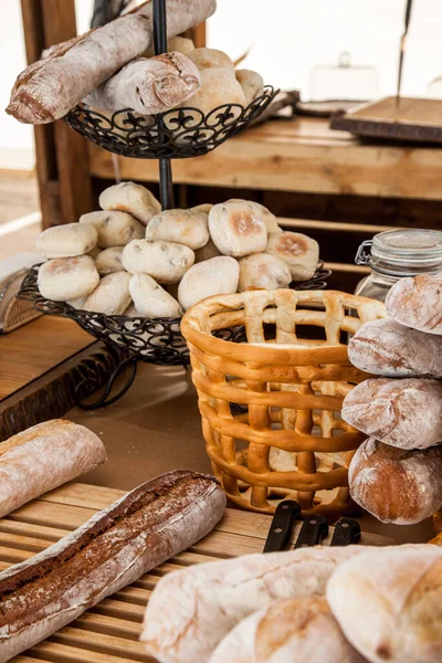 Different Baked Goods Table Stands Baskets Knives — Foto de Stock