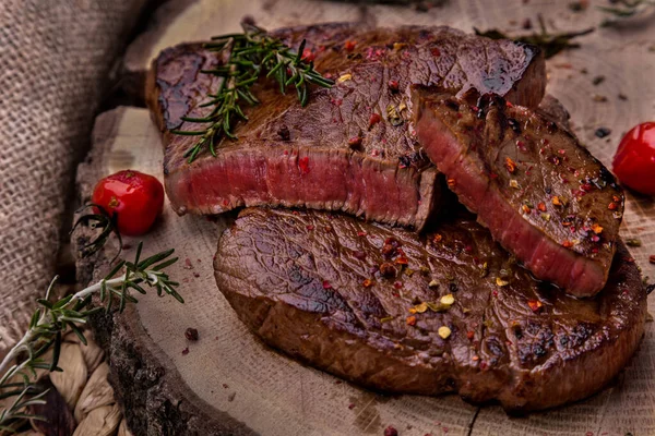 Bbq Steak Beef Slices Spices Cherry Tomatoes Rosemary Lying Wooden — Zdjęcie stockowe