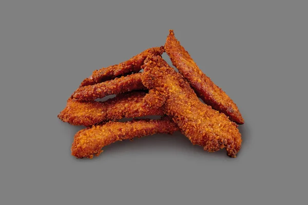 Chicken Strips Breaded Paprika Chili Portion Strips Lies Gray Background — Stockfoto