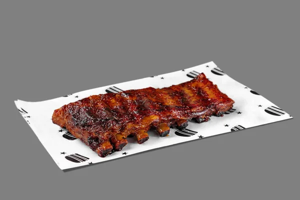 Grilled Pork Ribs Topped Barbecue Sauce Rebka Lie Paper Pattern — Zdjęcie stockowe