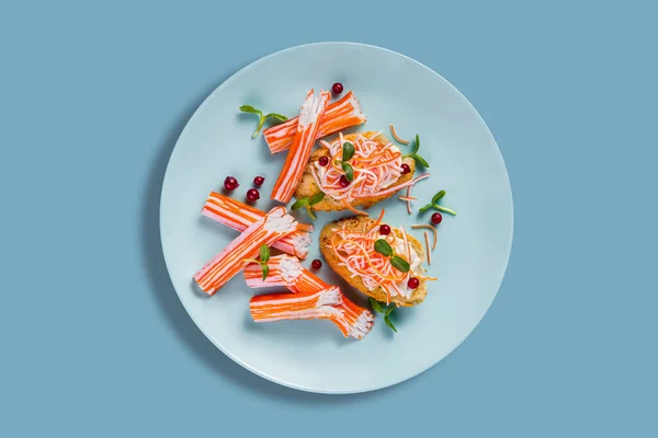 Sandwiches Crab Sticks Mung Bean Salad Red Currants Plate Blue — Stock fotografie