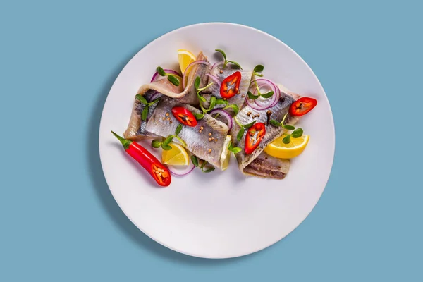 Herring Fillet Lemon Chili Mung Bean Salad Onions Plate Blue — Stock Fotó