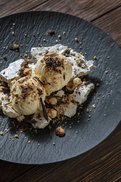 Ice Cream Balls Chocolate Chips Hazelnuts Peanuts Meringues Plate Wooden — Stok fotoğraf