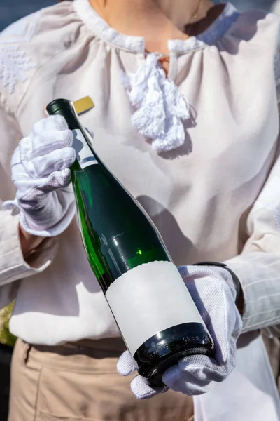 Girl Waiter Uniform Holds Bottle Wine Her Hand — Foto de Stock