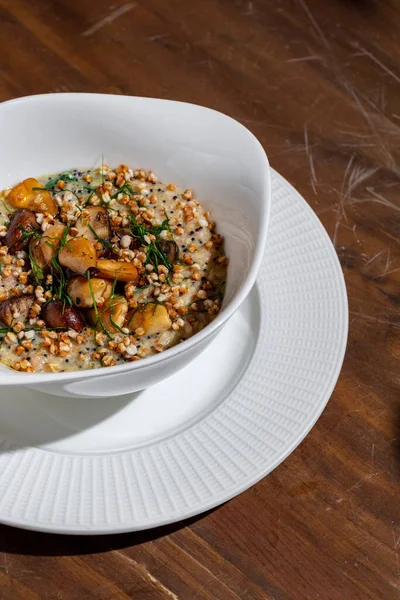 Porridge Wheat Mushrooms Herbs Plate Wooden Table — Stockfoto