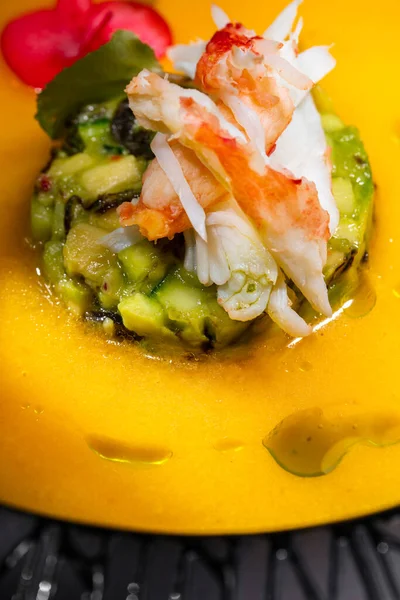 Mango Puree Soup Diced Avocado Crab Fillet Top Soup Poured — Stockfoto