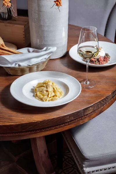 Spaghetti Sauce Plate Wooden Table Glass Wine Grissini Basket Another — Fotografia de Stock