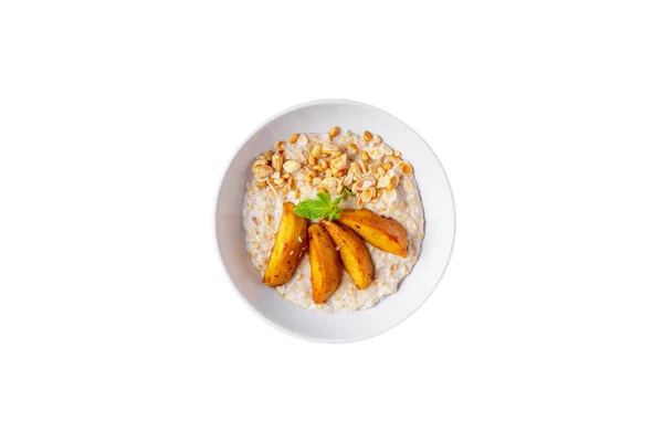 Oatmeal Fried Potatoes Mint Peanuts Seeds Plate White Background — стоковое фото